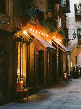 Night-time Barcelona old town street near homes where we carry out kitchen remodel Barcelona projects