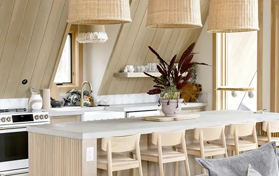 Kitchen Remodel Barcelona Scandinavian-inspired light wood kitchen with long island, woven pendant lights and neutral finishes